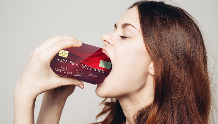 woman eating drinking credit card of plastic microplastic